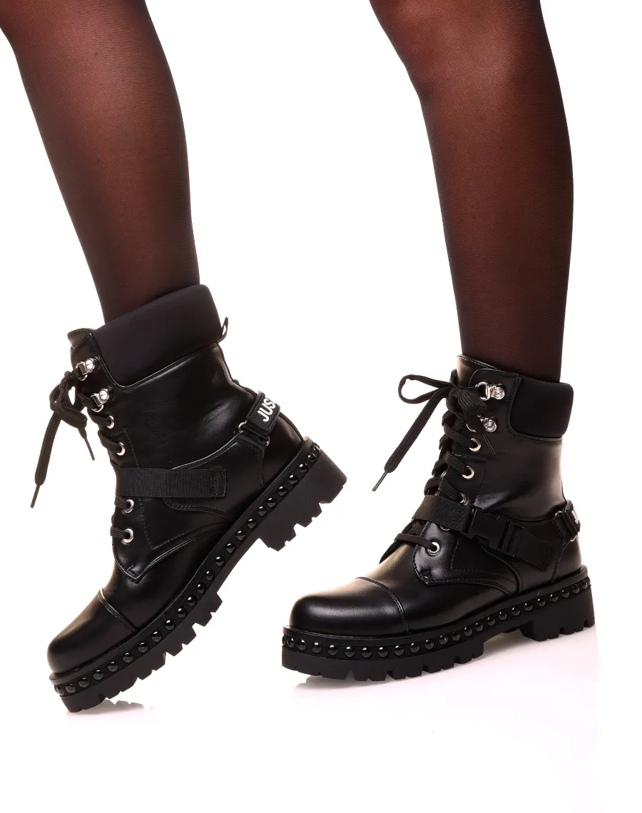 Bottines montante noire à lacets et lanière