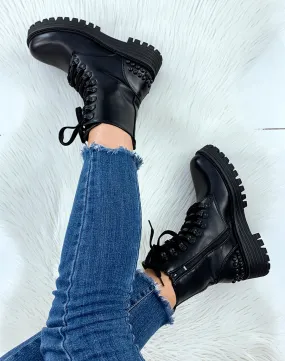 Bottines montantes noires à semelle crantée