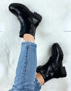 Bottines montantes noires à zip