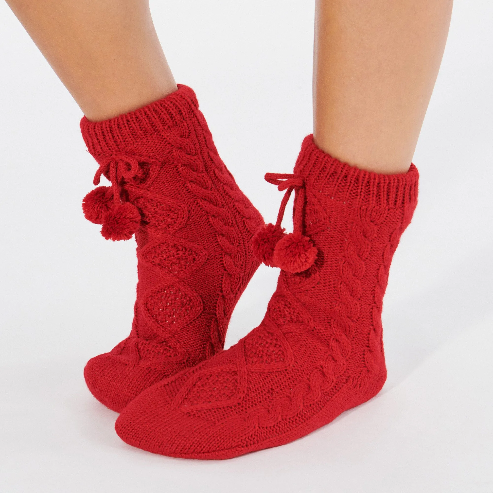 Chaussettes montantes avec pompon