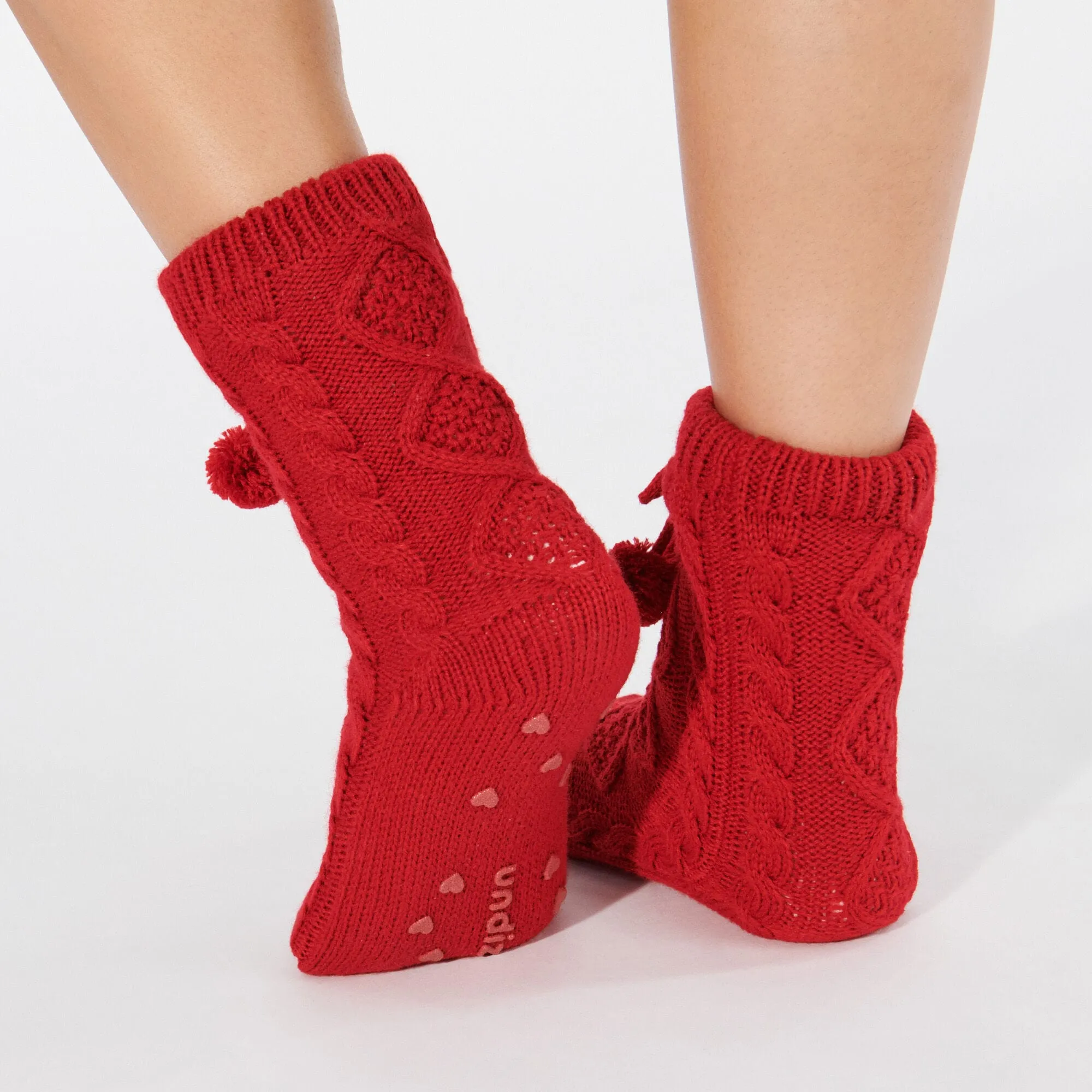 Chaussettes montantes avec pompon