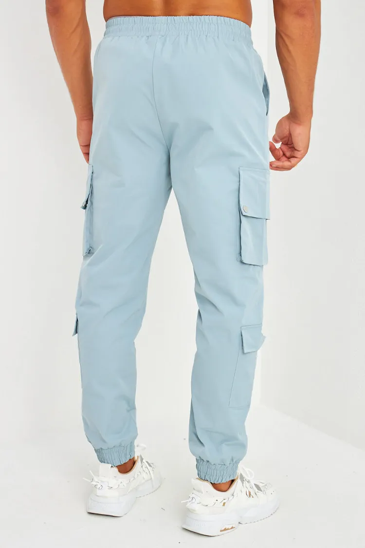 Pantalon de jogging bleu grisé double poches cargo