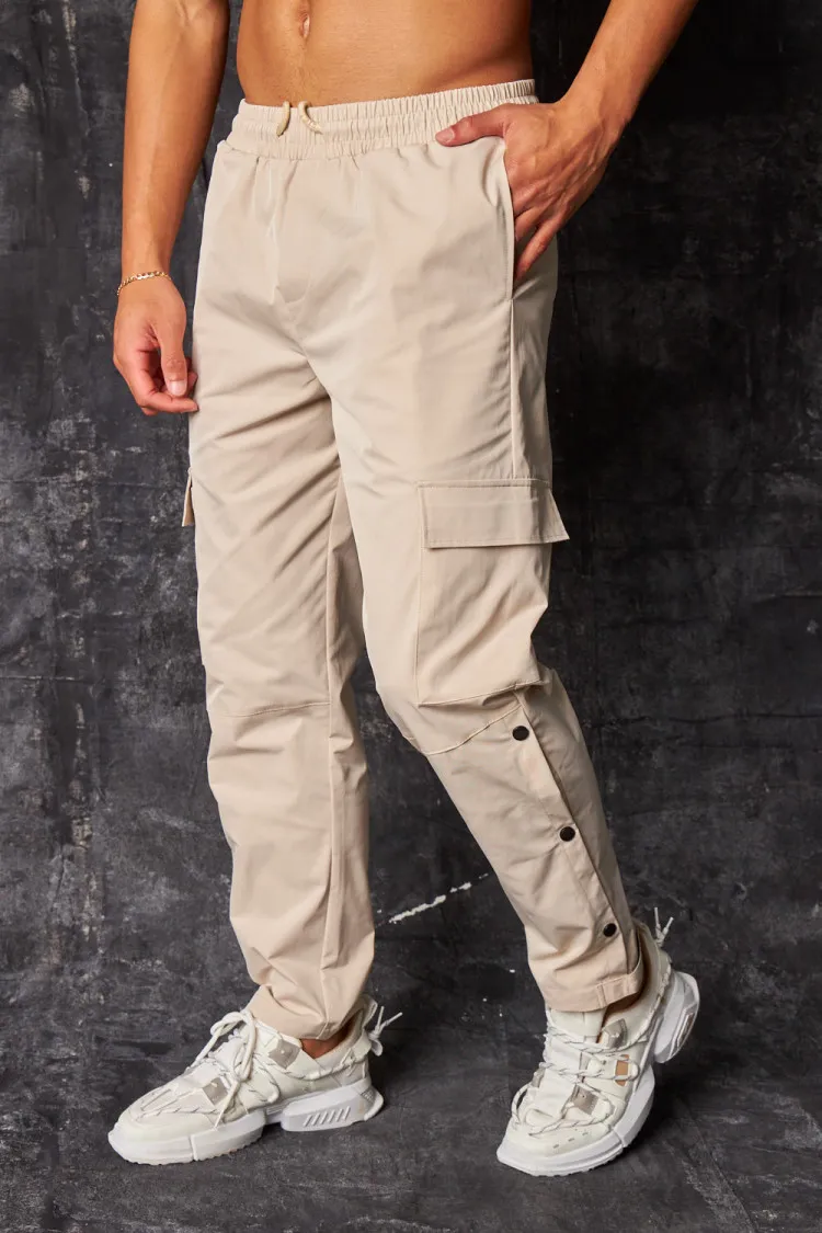 Pantalon de jogging cargo à boutons pressions beige