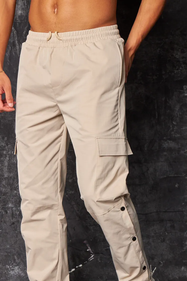 Pantalon de jogging cargo à boutons pressions beige