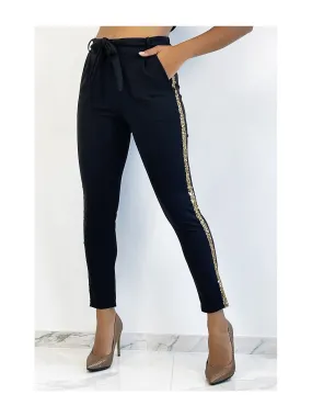 Pantalon fluide noir à bandes et à sequins dorés