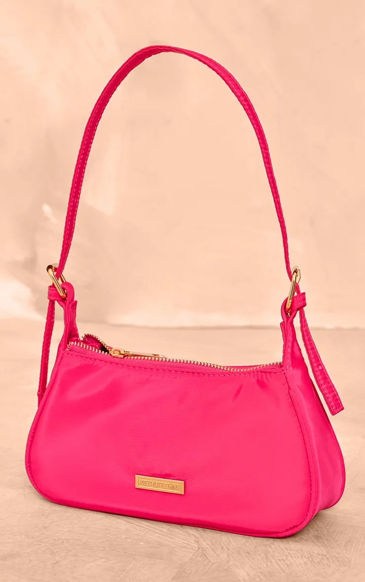 PRETTYLITTLETHING Mini sac trapèze en nylon rose fluo